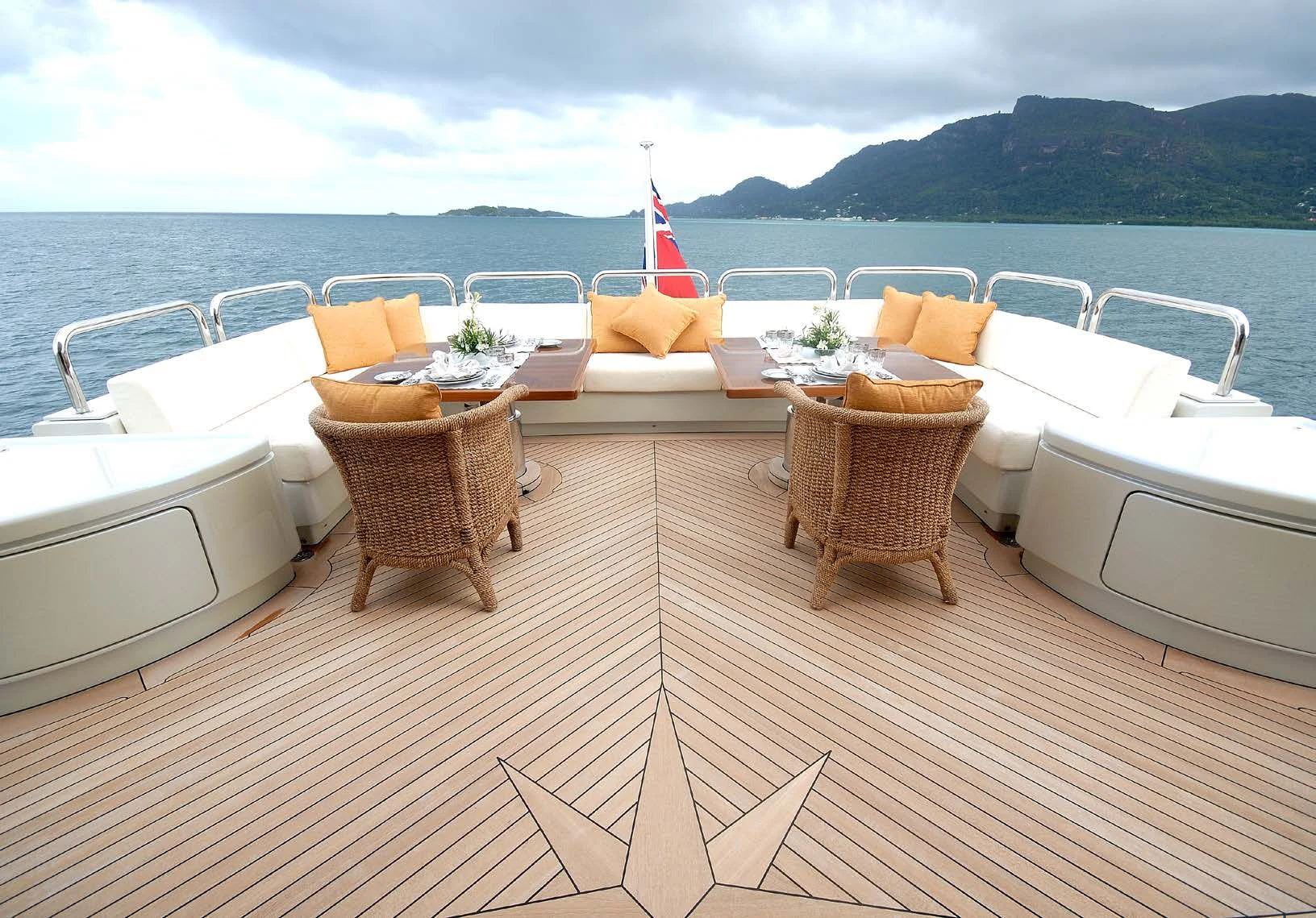 a deck with chairs and tables on it aboard AQUAMARINA Yacht for Sale