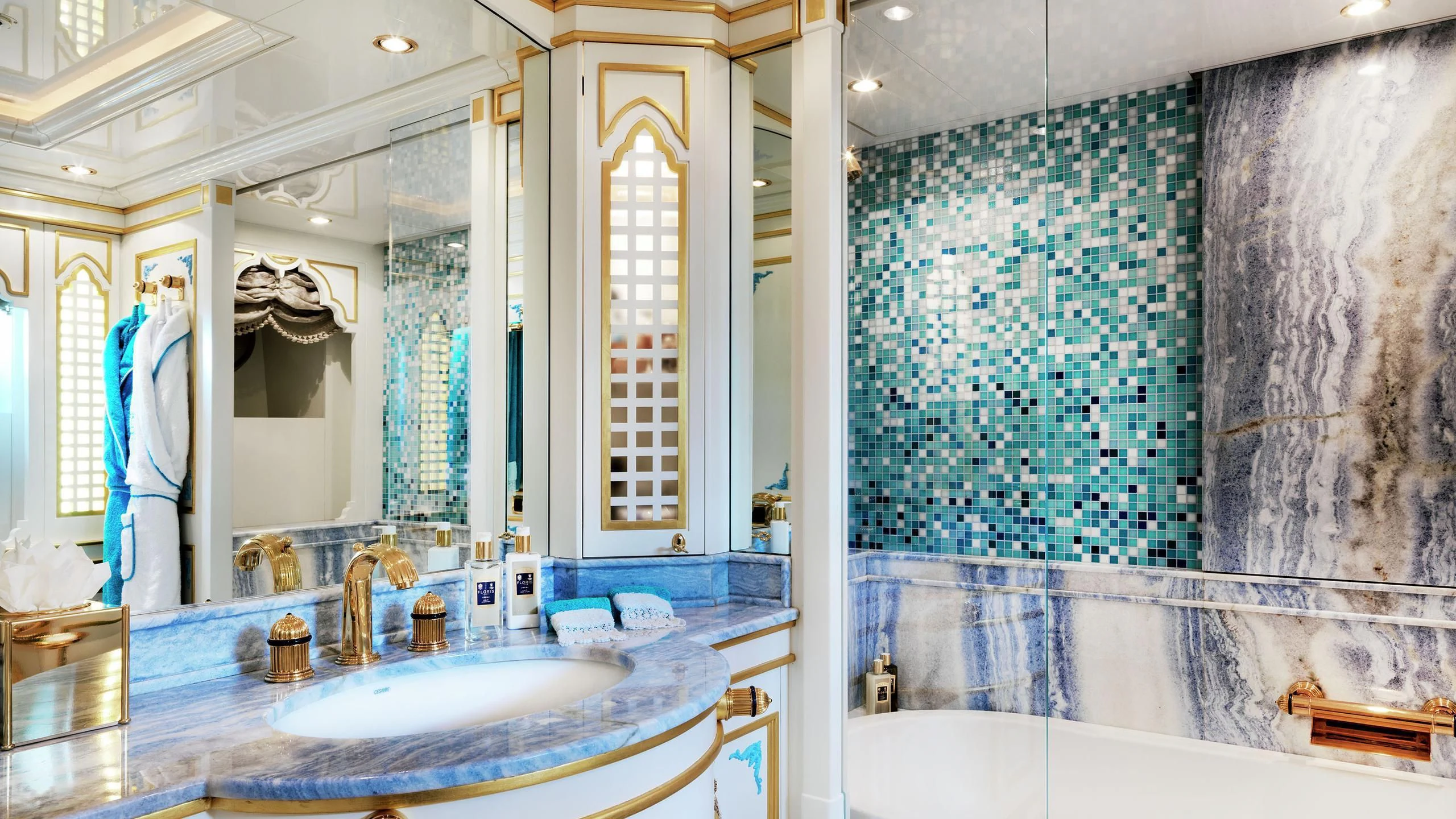 a bathroom with a large mirror aboard AQUAMARINA Yacht for Sale