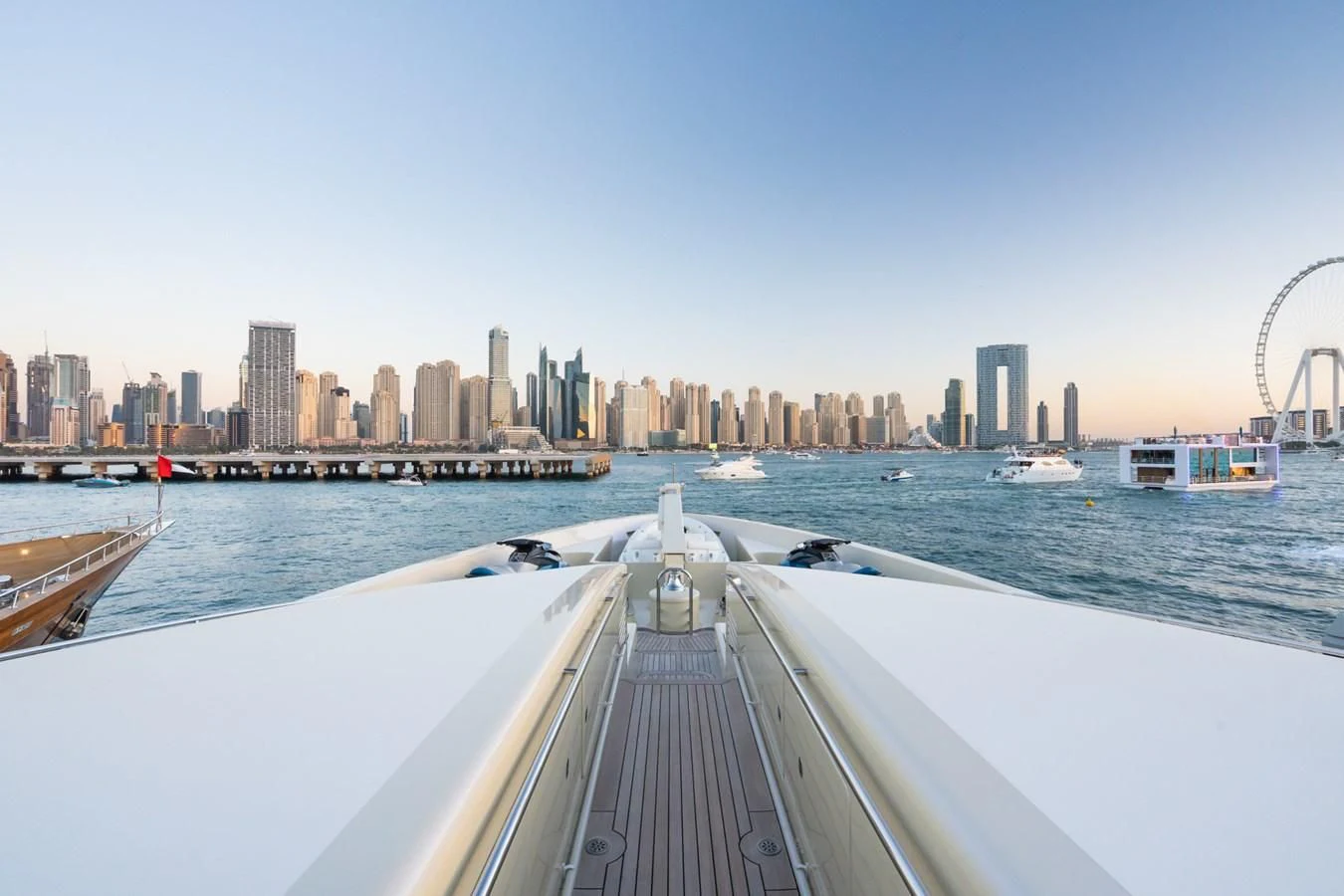 a bridge over water with a city in the background aboard AQUAMARINA Yacht for Sale
