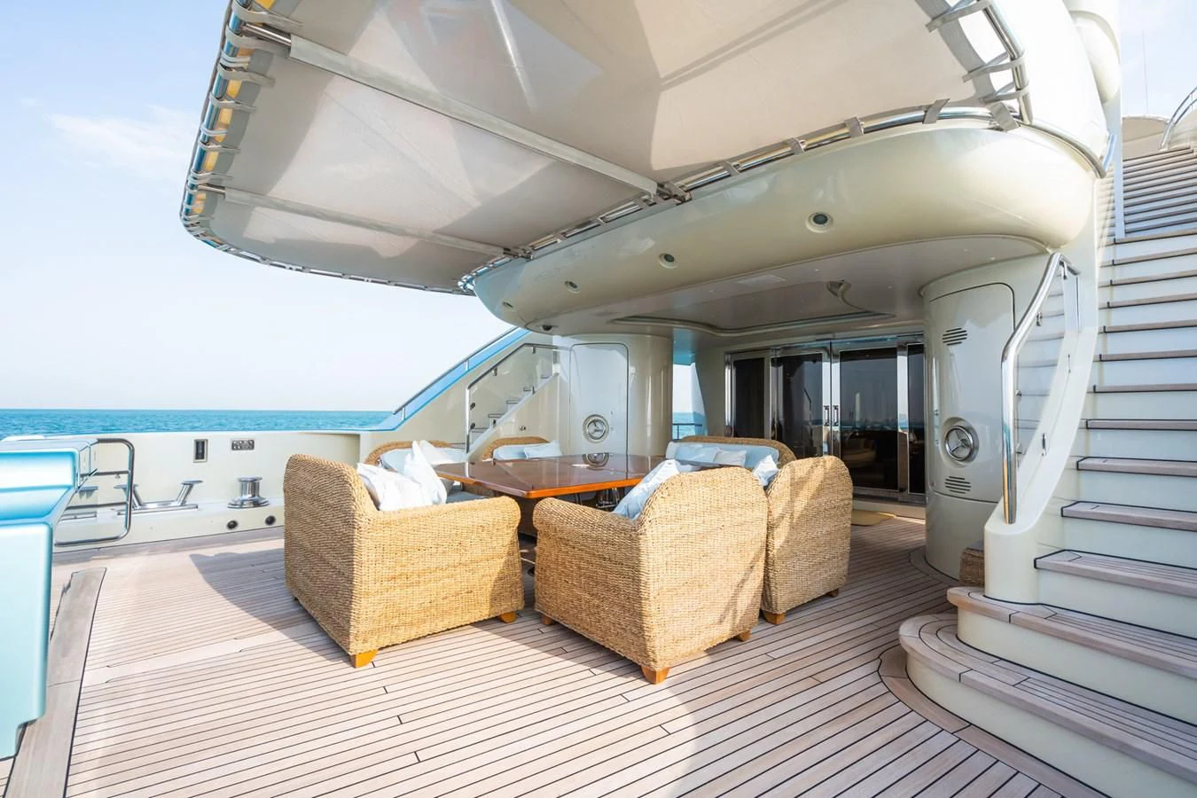 a large living room with a large balcony aboard AQUAMARINA Yacht for Sale