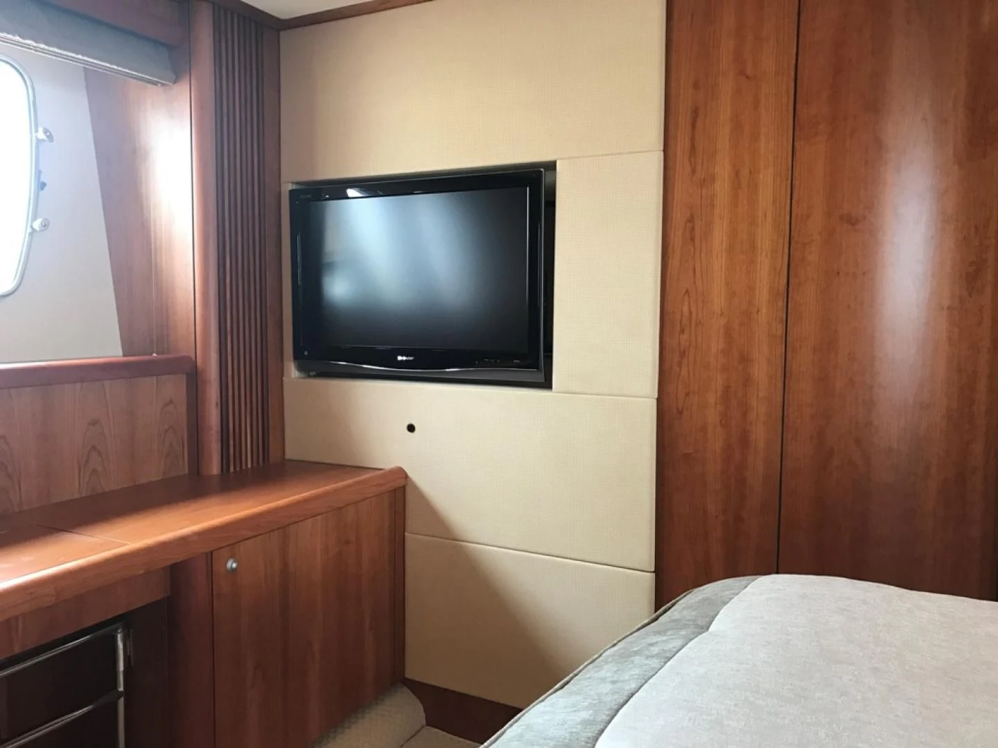 a tv on a wall aboard DAY DREAMER Yacht for Sale