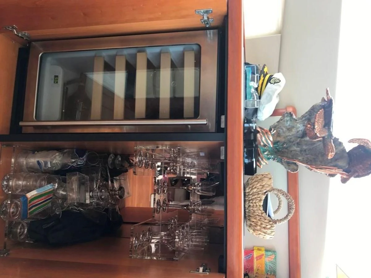 a cat sitting on a shelf aboard DAY DREAMER Yacht for Sale