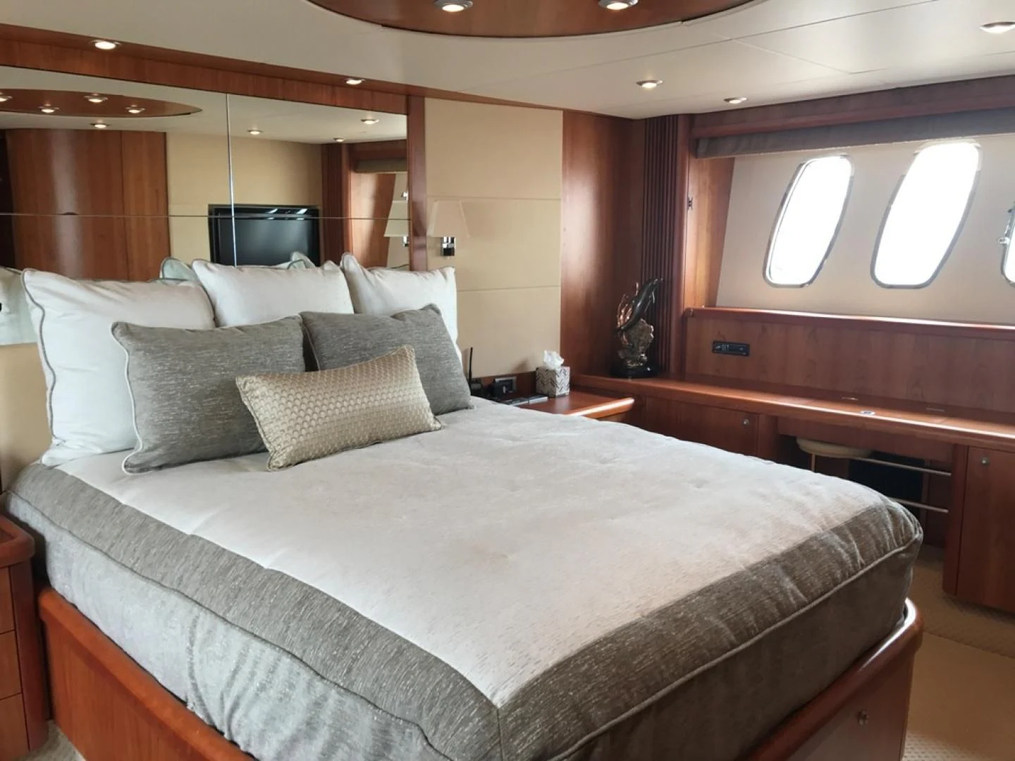 a bed with pillows aboard DAY DREAMER Yacht for Sale