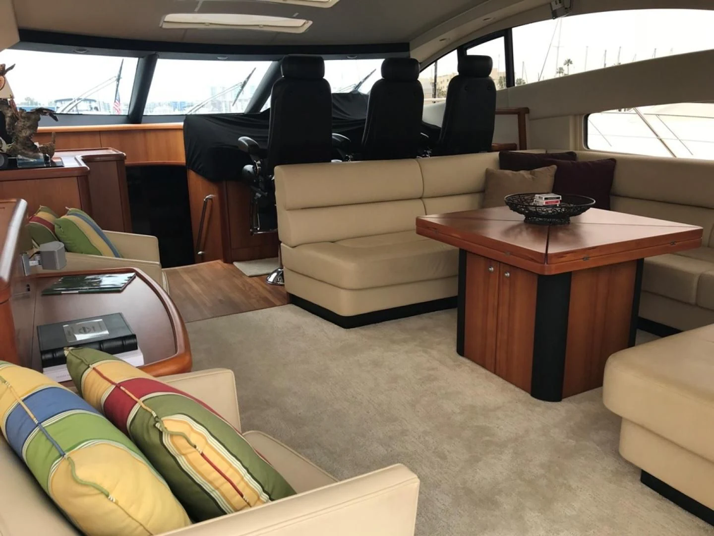 a car with a desk and a couch aboard DAY DREAMER Yacht for Sale
