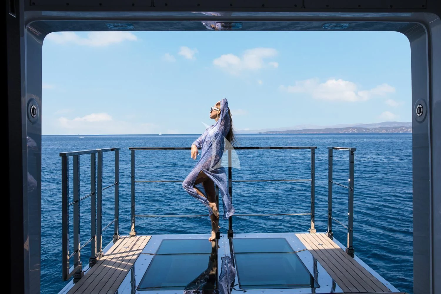 a person standing on a boat aboard PERSEFONI I Yacht for Sale