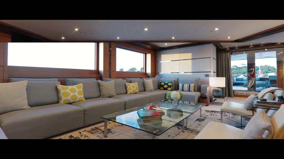 a living room with a large window aboard PERSEFONI I Yacht for Sale