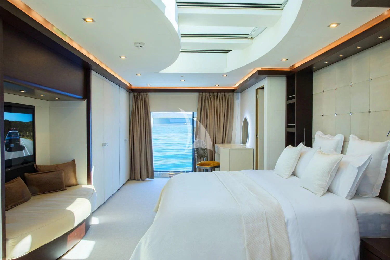 a room with a bed and a tv aboard PERSEFONI I Yacht for Sale