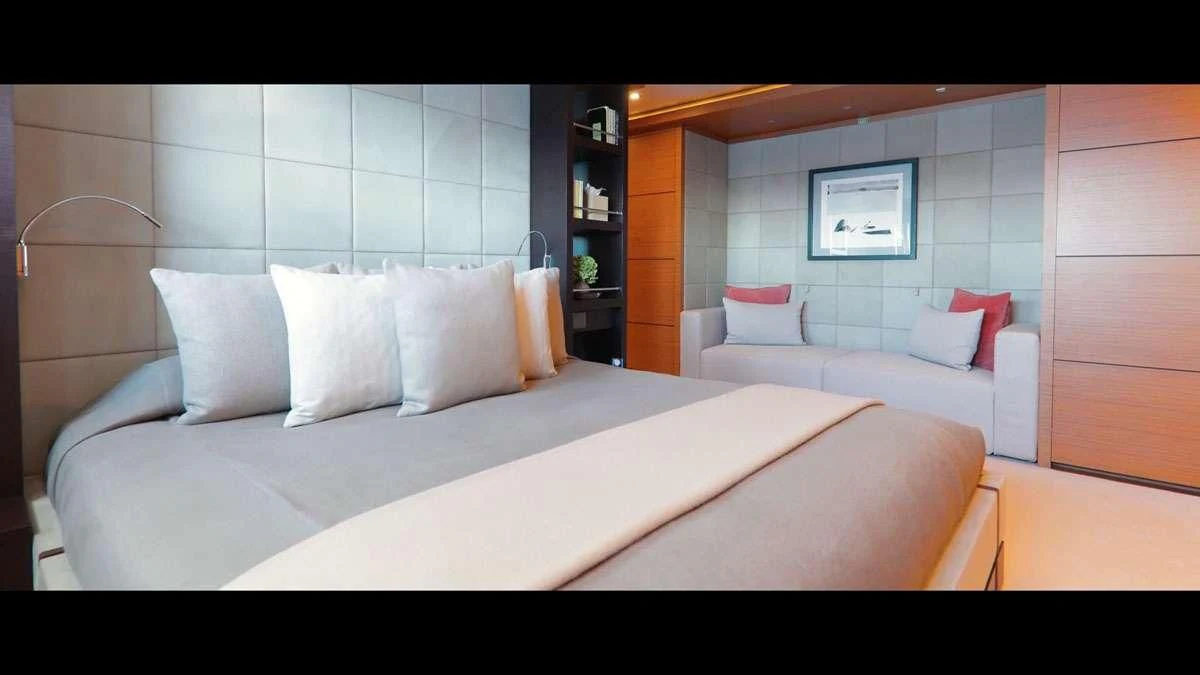 a bed in a room aboard PERSEFONI I Yacht for Sale