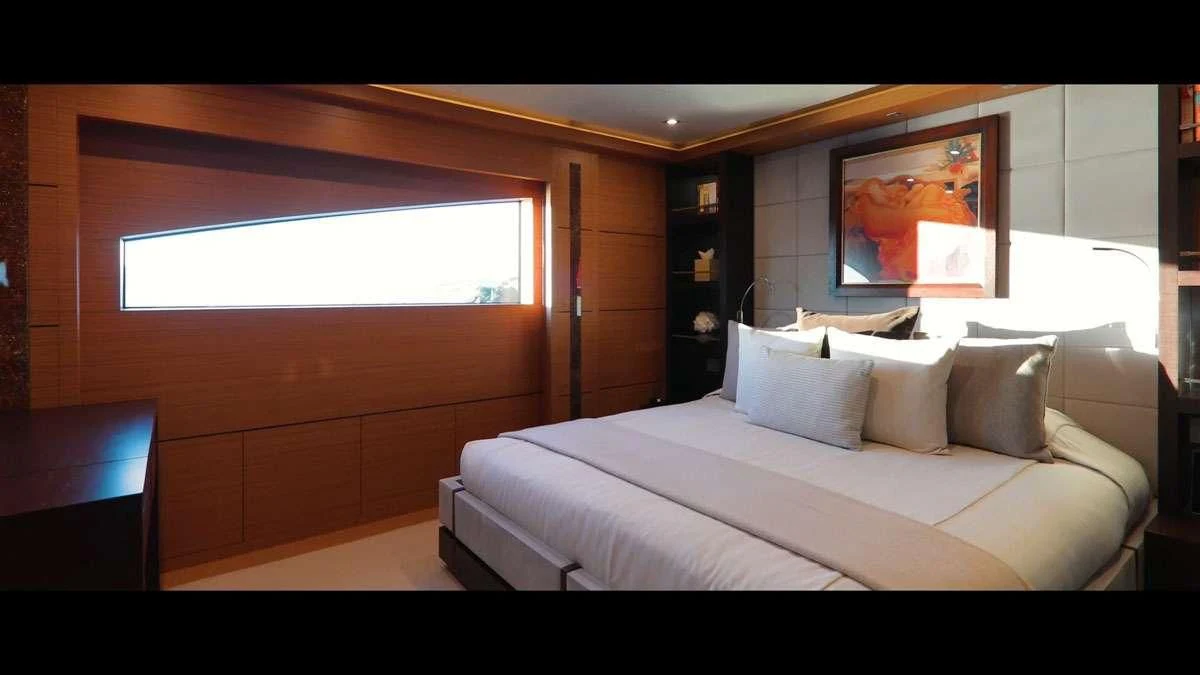 a bed in a room aboard PERSEFONI I Yacht for Sale