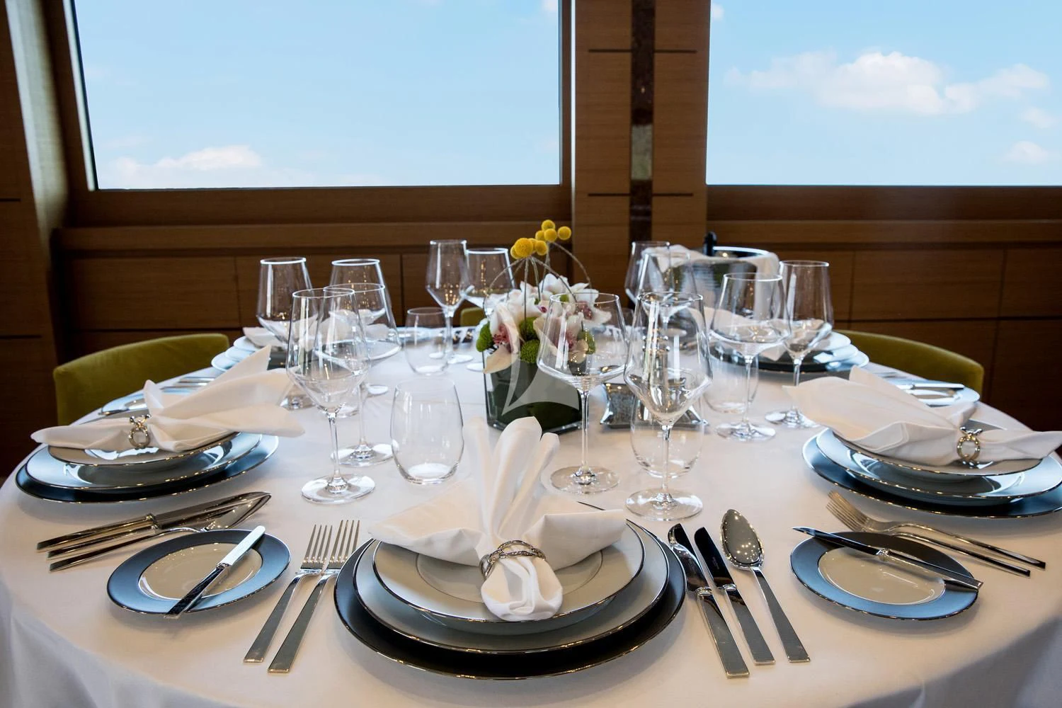 a table set with place settings aboard PERSEFONI I Yacht for Sale