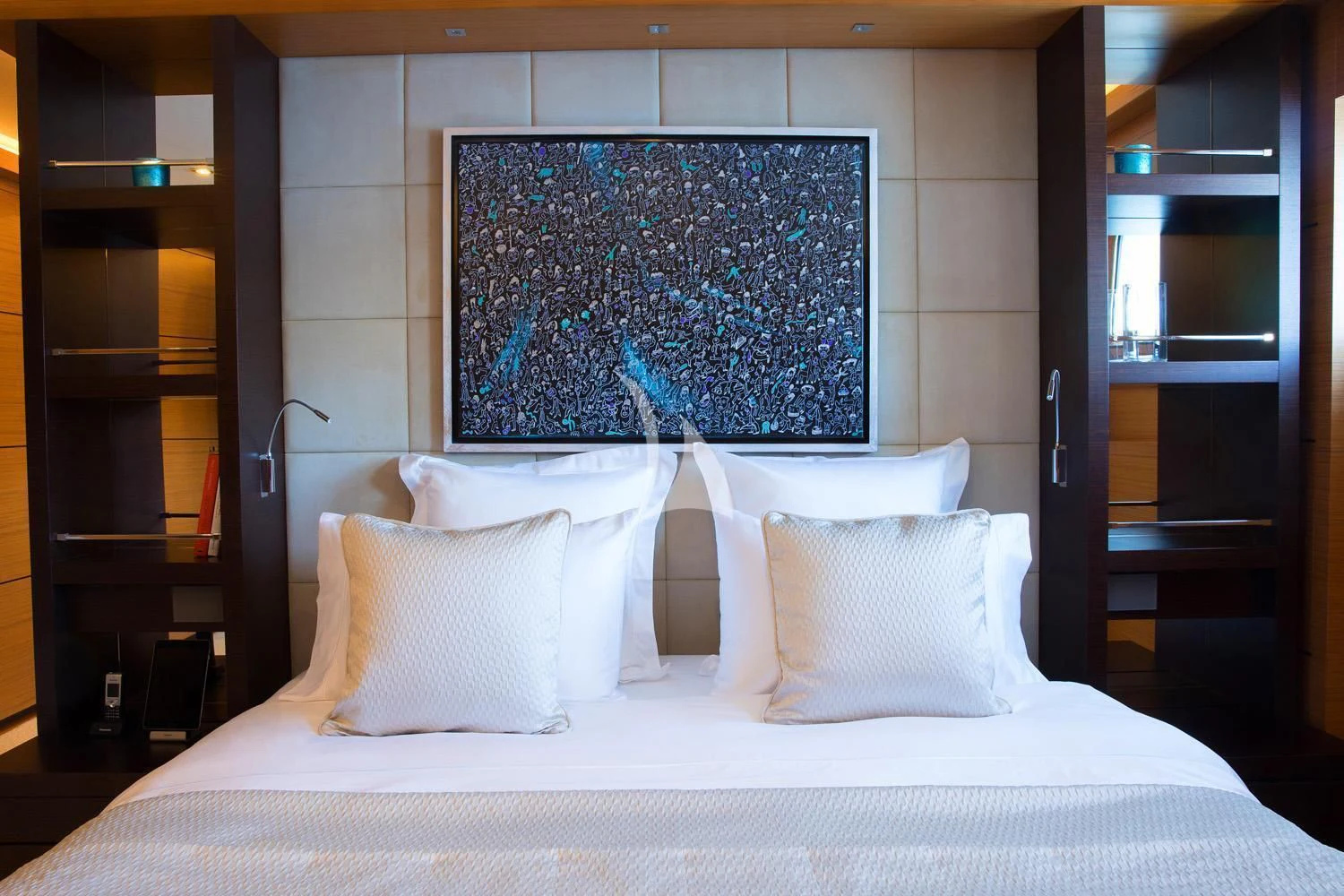 a bed with white sheets and pillows aboard PERSEFONI I Yacht for Sale