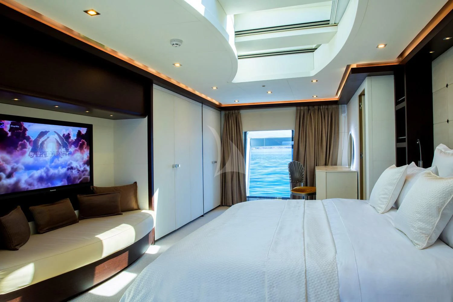 a bed in a room aboard PERSEFONI I Yacht for Sale