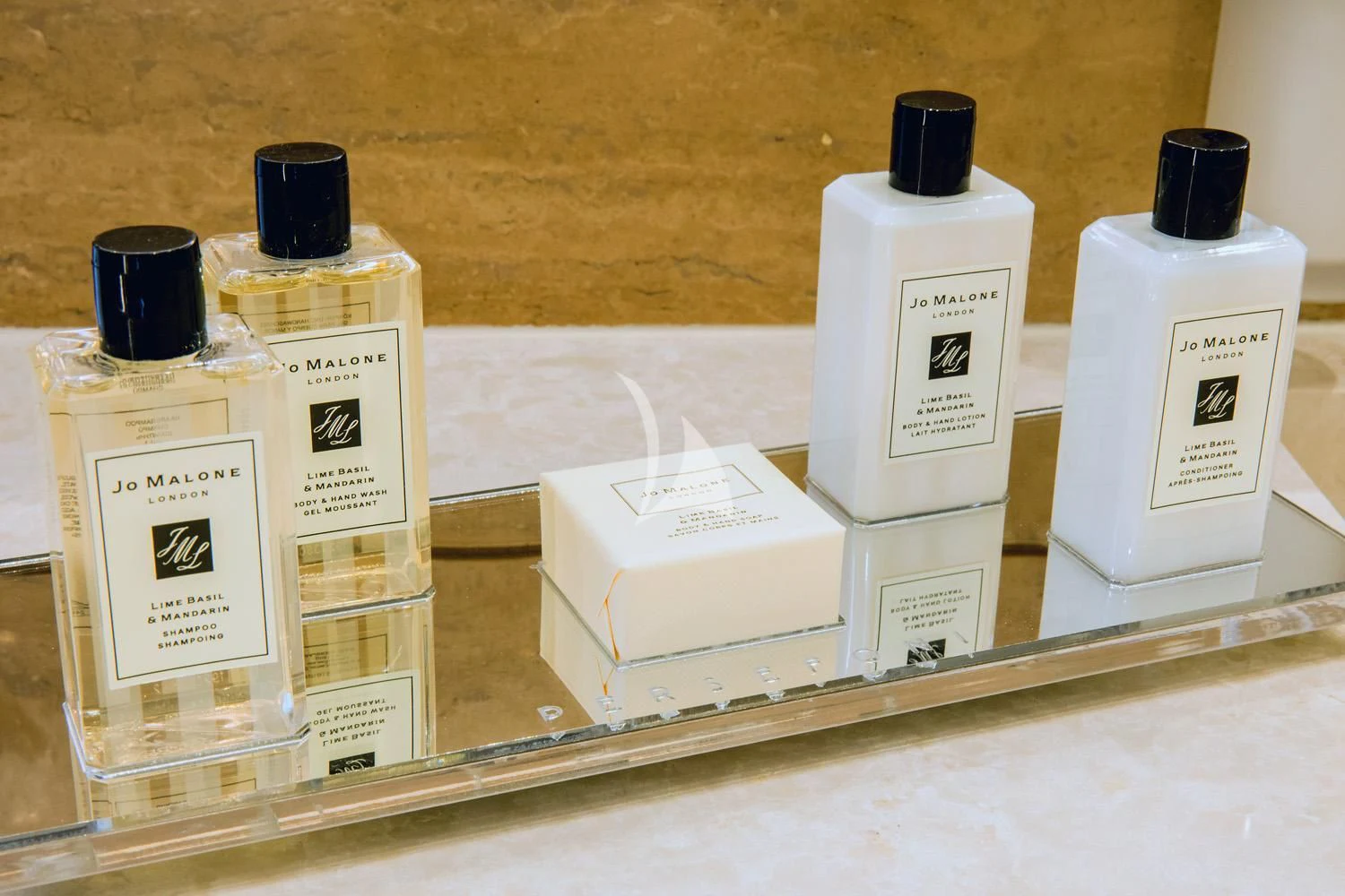 a group of white containers with black labels on a white surface aboard PERSEFONI I Yacht for Sale