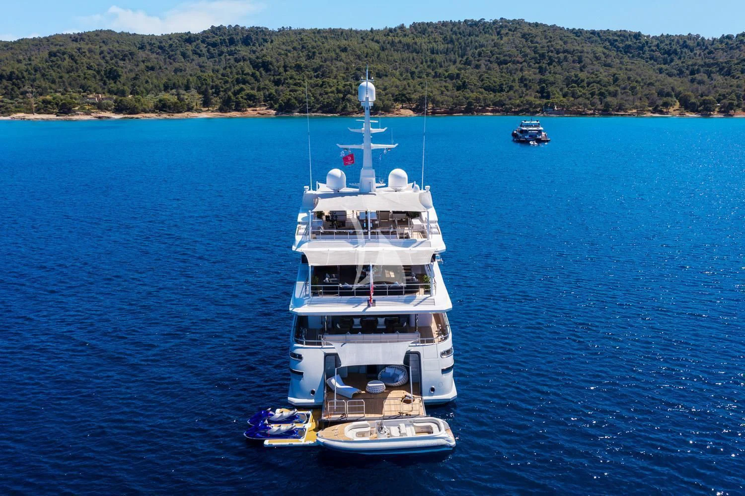 a large white boat in the water aboard PERSEFONI I Yacht for Sale