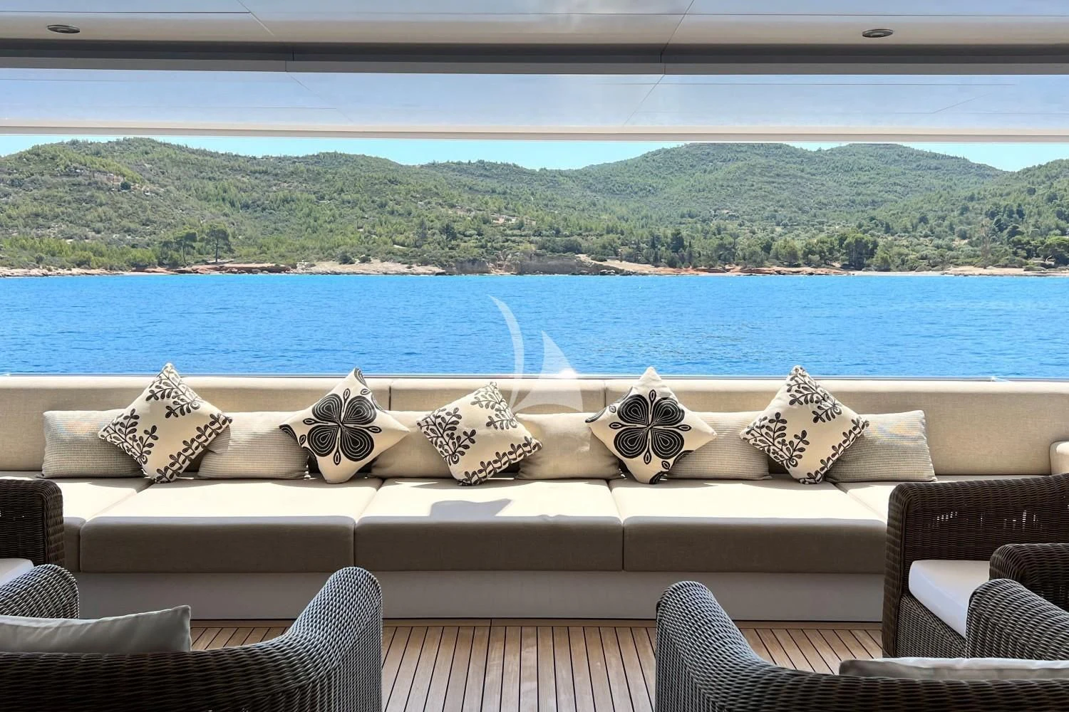 a couch with pillows on it aboard PERSEFONI I Yacht for Sale