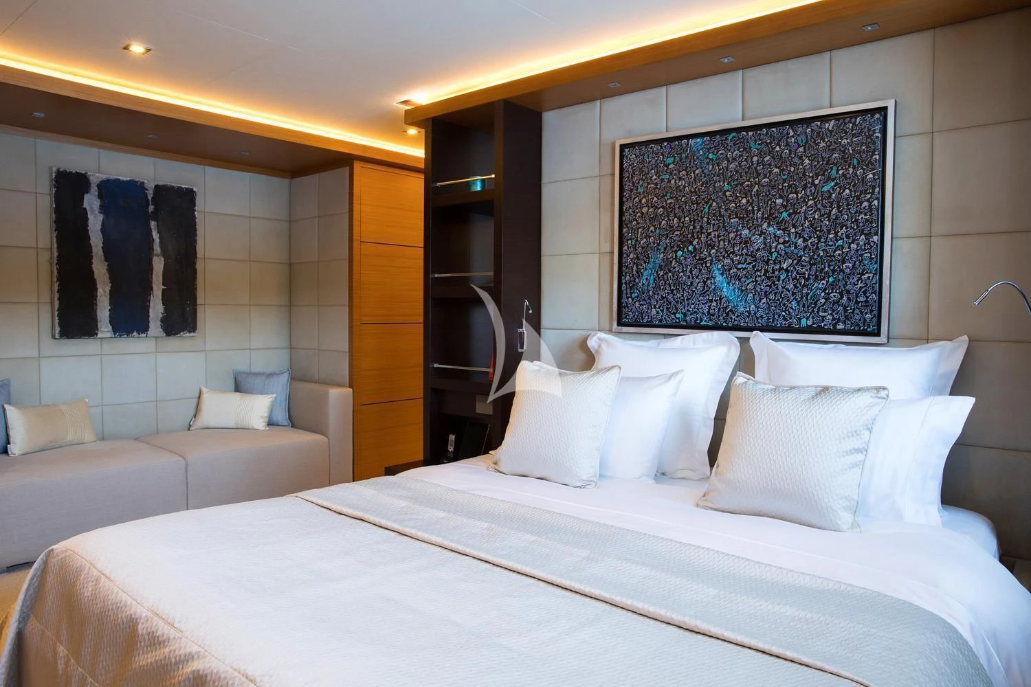 a bed with white pillows aboard PERSEFONI I Yacht for Sale