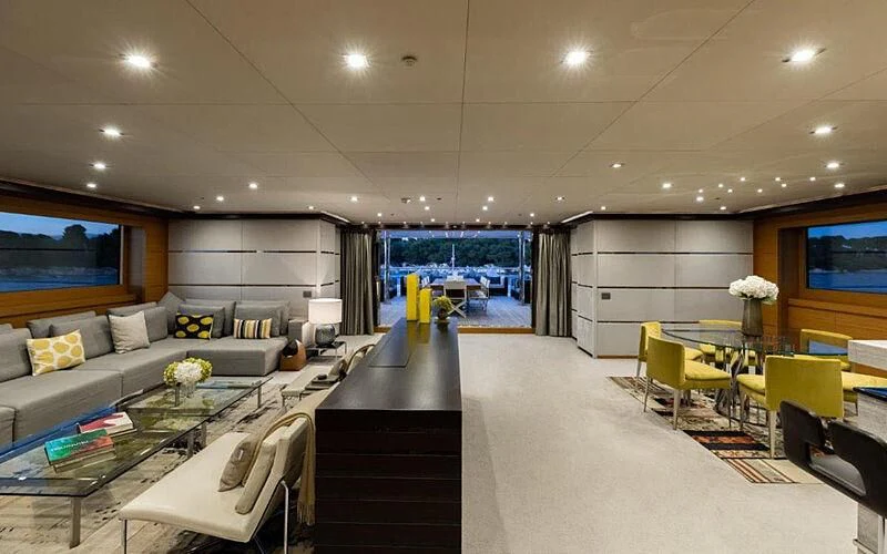 a living room with a large window aboard PERSEFONI I Yacht for Sale