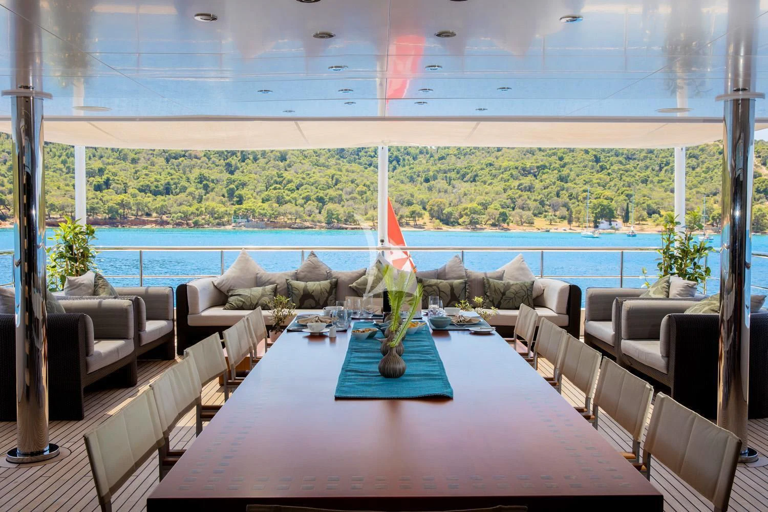 a table with a vase on it aboard PERSEFONI I Yacht for Sale