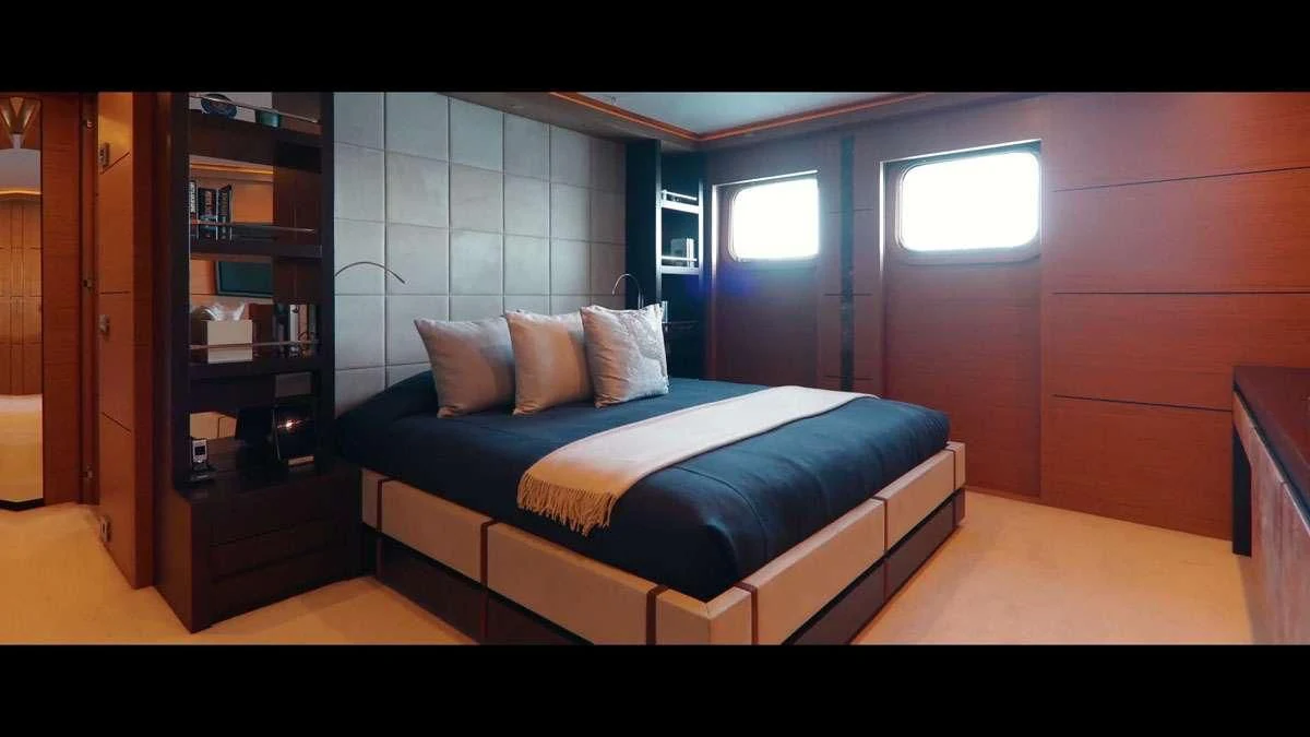 a bed in a room aboard PERSEFONI I Yacht for Sale