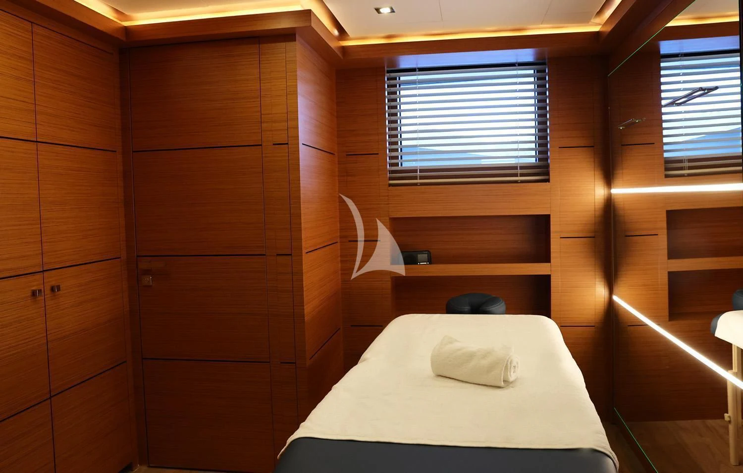 a bed in a room aboard PERSEFONI I Yacht for Sale