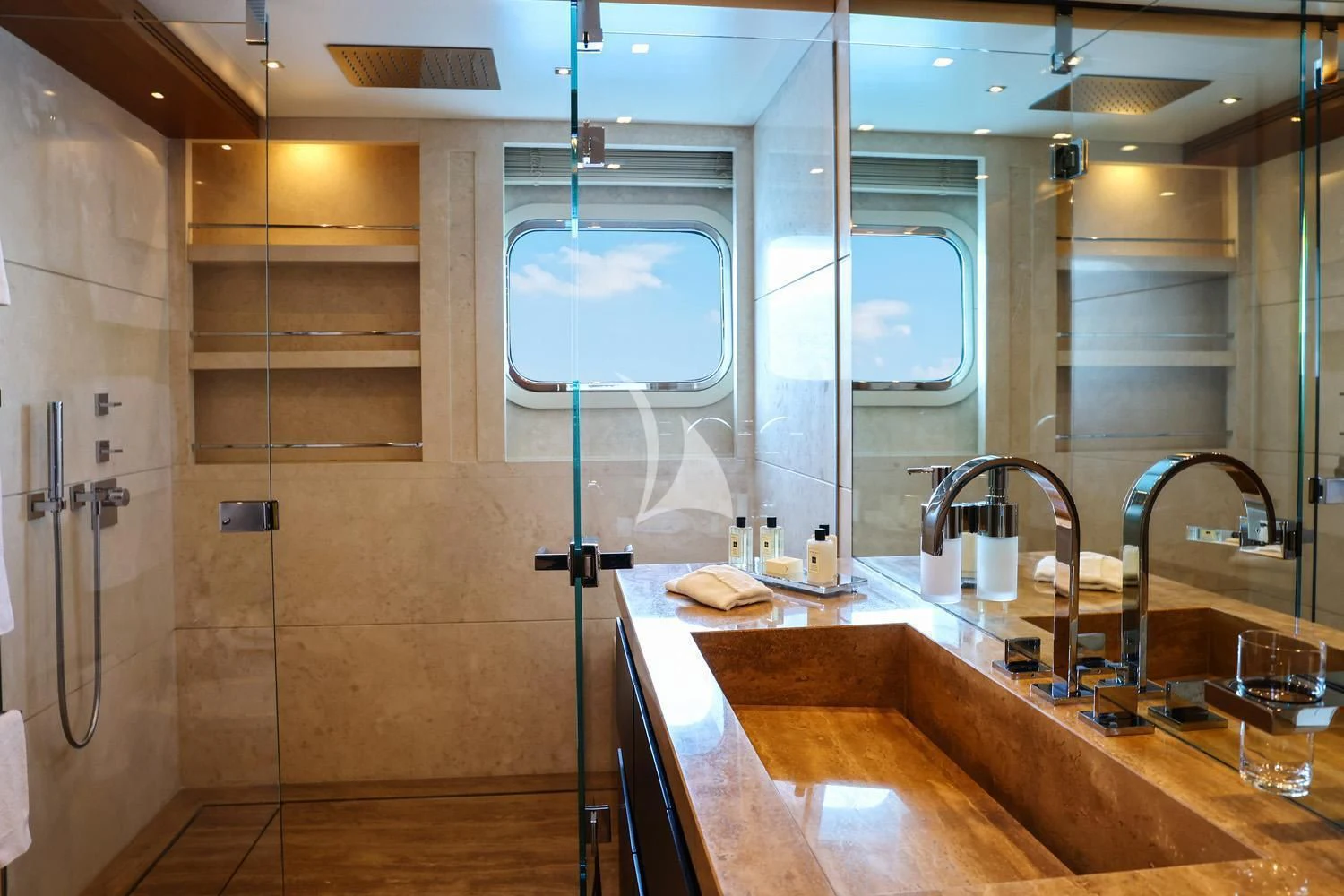 a bathroom with a large glass shower aboard PERSEFONI I Yacht for Sale