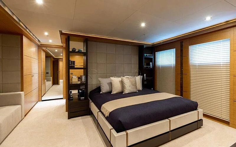 a bed in a room aboard PERSEFONI I Yacht for Sale