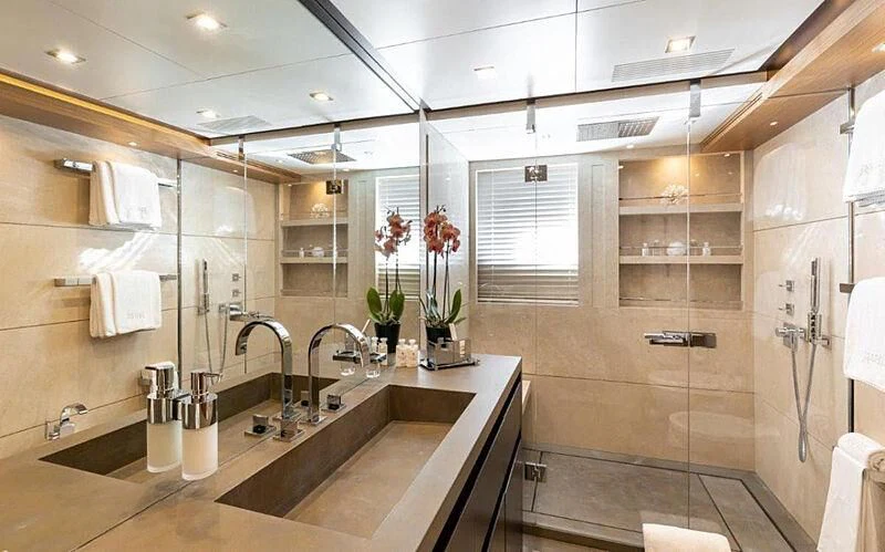 a bathroom with a sink and a shower aboard PERSEFONI I Yacht for Sale