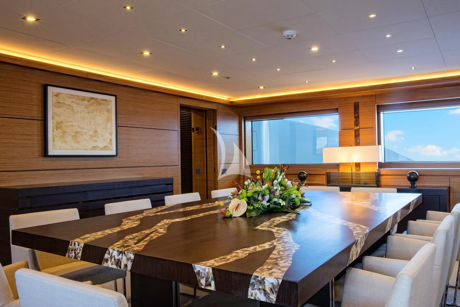 a room with a table and chairs aboard PERSEFONI I Yacht for Sale