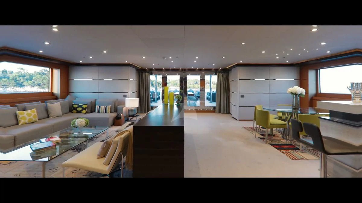 a living room with a couch and a table aboard PERSEFONI I Yacht for Sale