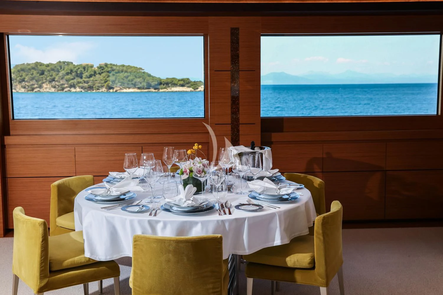 a table set for a dinner aboard PERSEFONI I Yacht for Sale