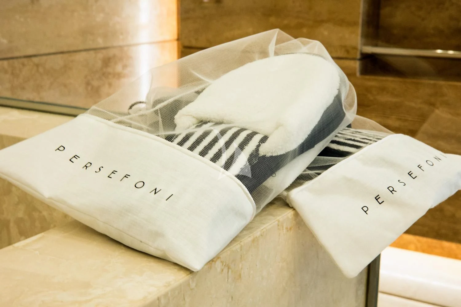a pair of white gloves on a table aboard PERSEFONI I Yacht for Sale