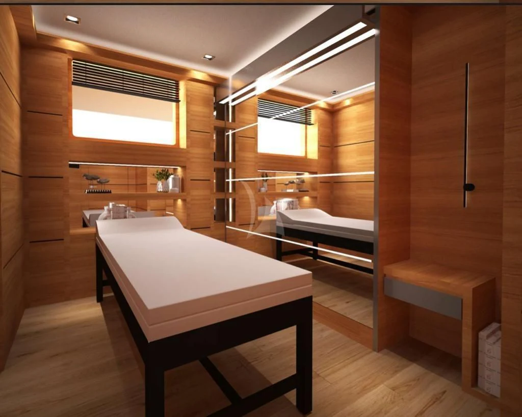 a room with a bed and a mirror aboard PERSEFONI I Yacht for Sale