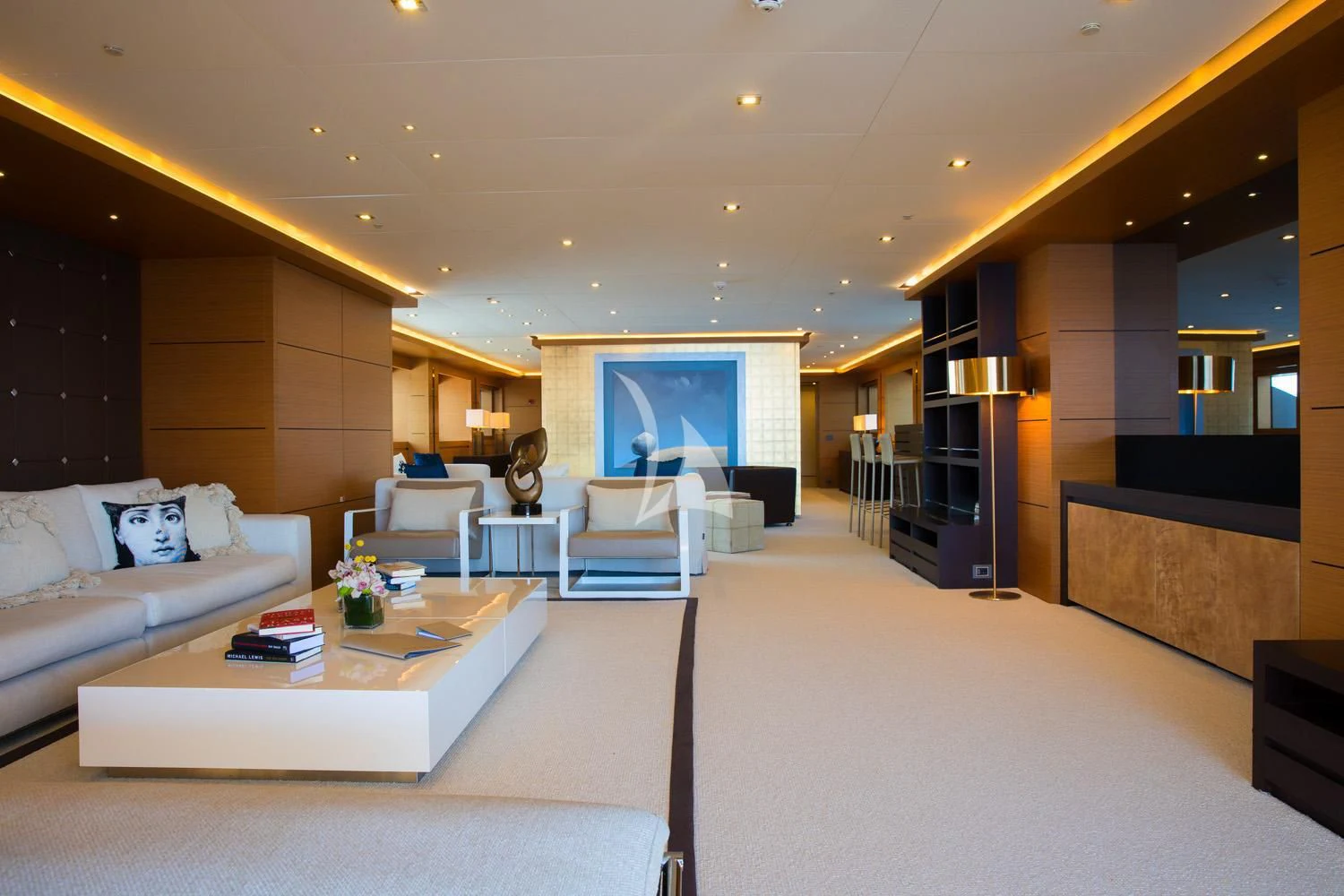 a living room with a large open door aboard PERSEFONI I Yacht for Sale