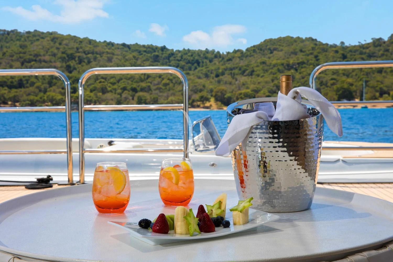 a sink with a faucet and fruits on it aboard PERSEFONI I Yacht for Sale