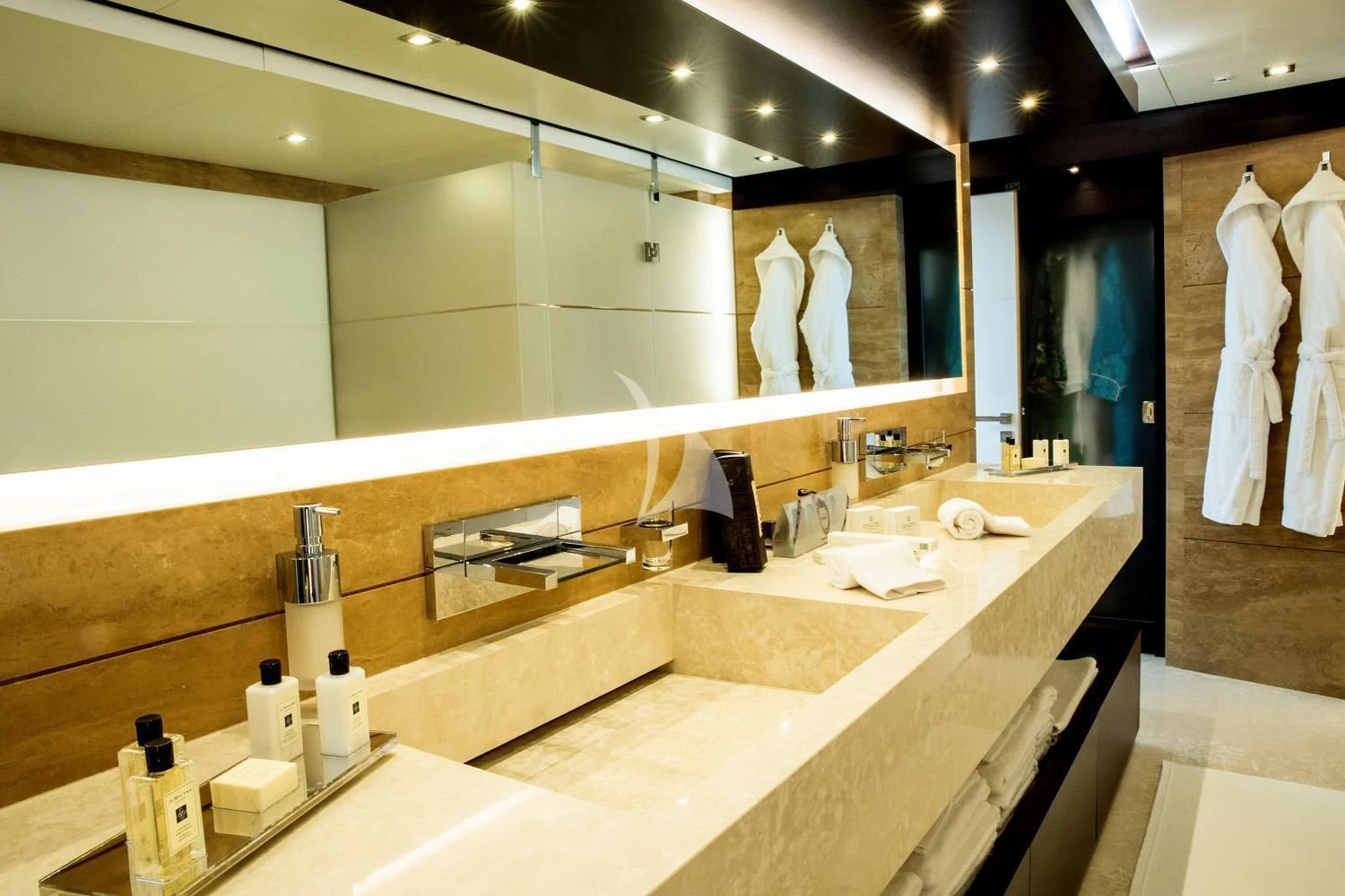 a bathroom with a large mirror aboard PERSEFONI I Yacht for Sale