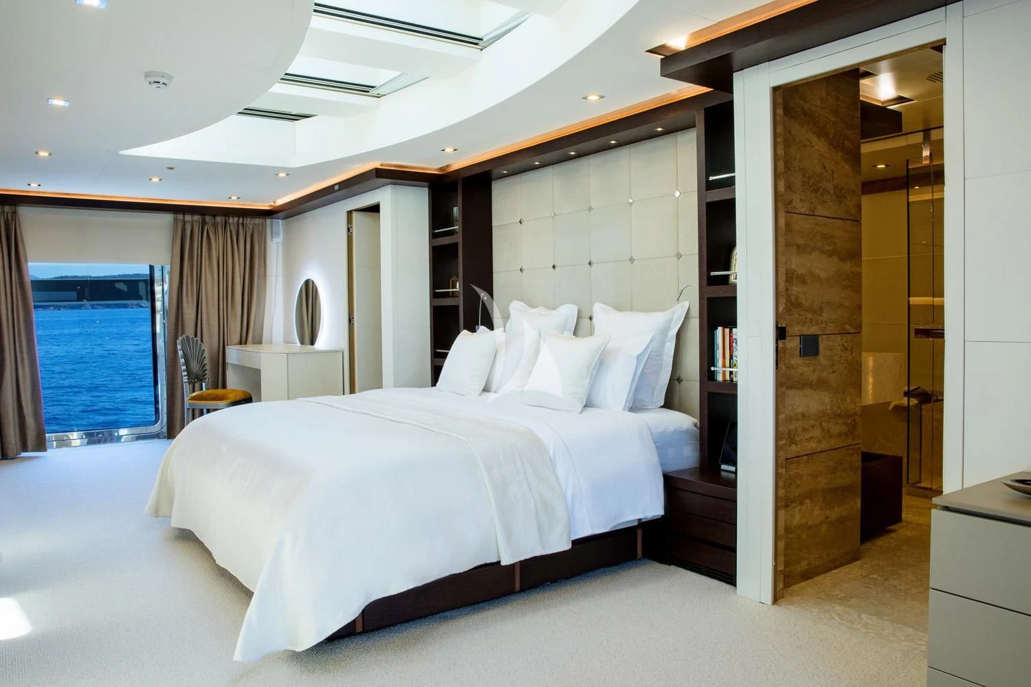a large bedroom with a large bed aboard PERSEFONI I Yacht for Sale