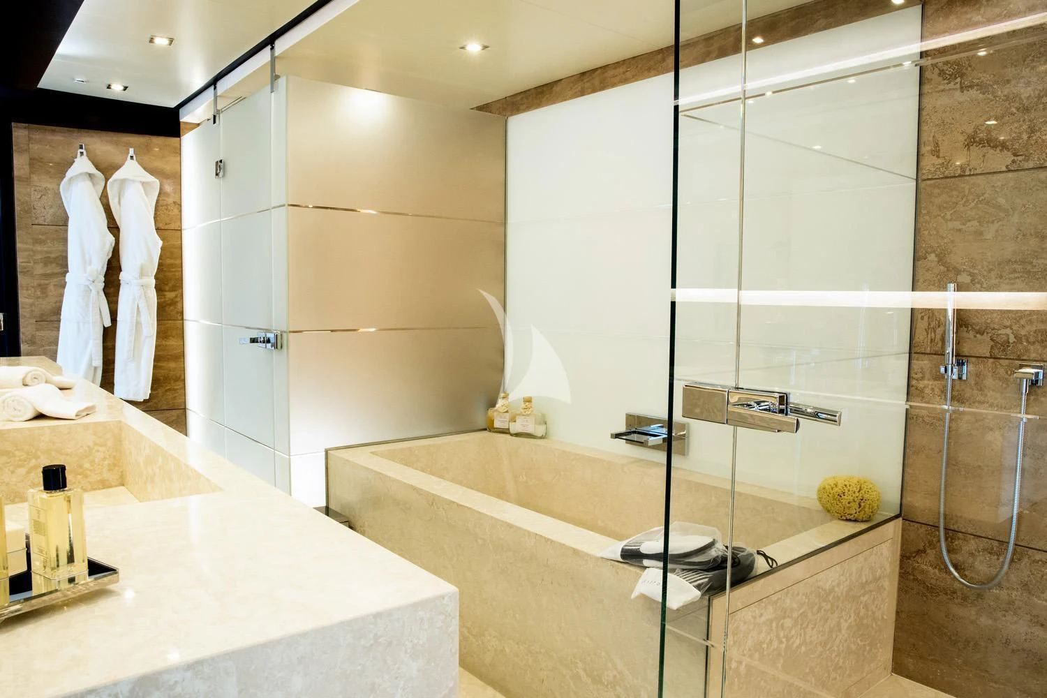 a bathroom with a glass shower aboard PERSEFONI I Yacht for Sale