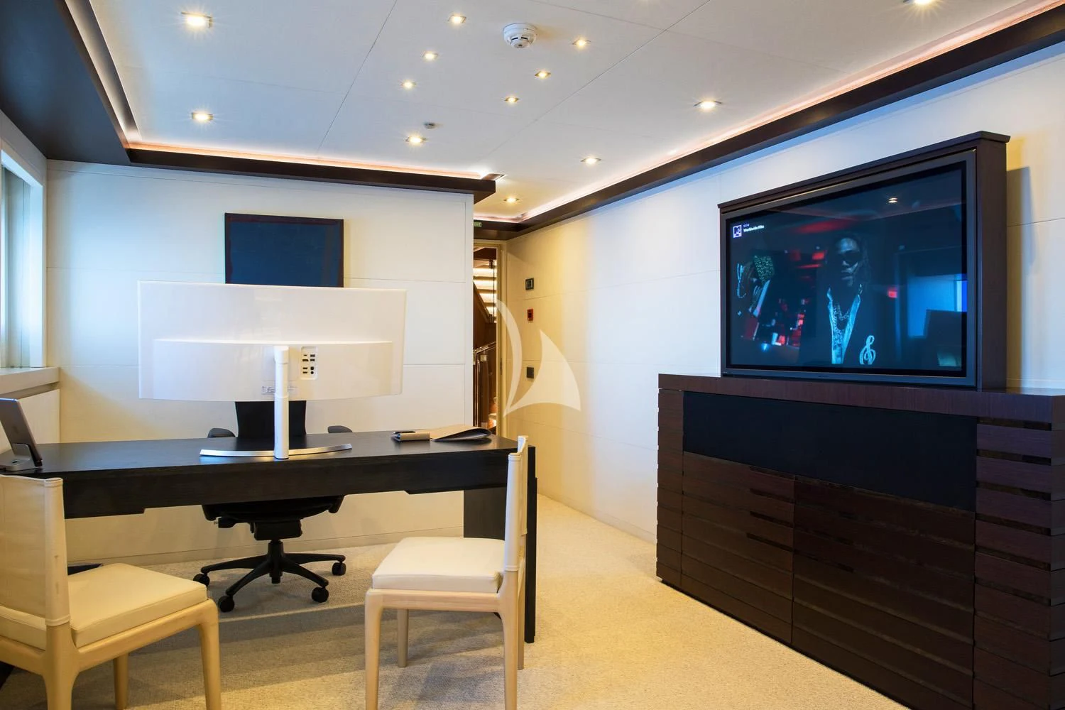 a room with a table and chairs aboard PERSEFONI I Yacht for Sale
