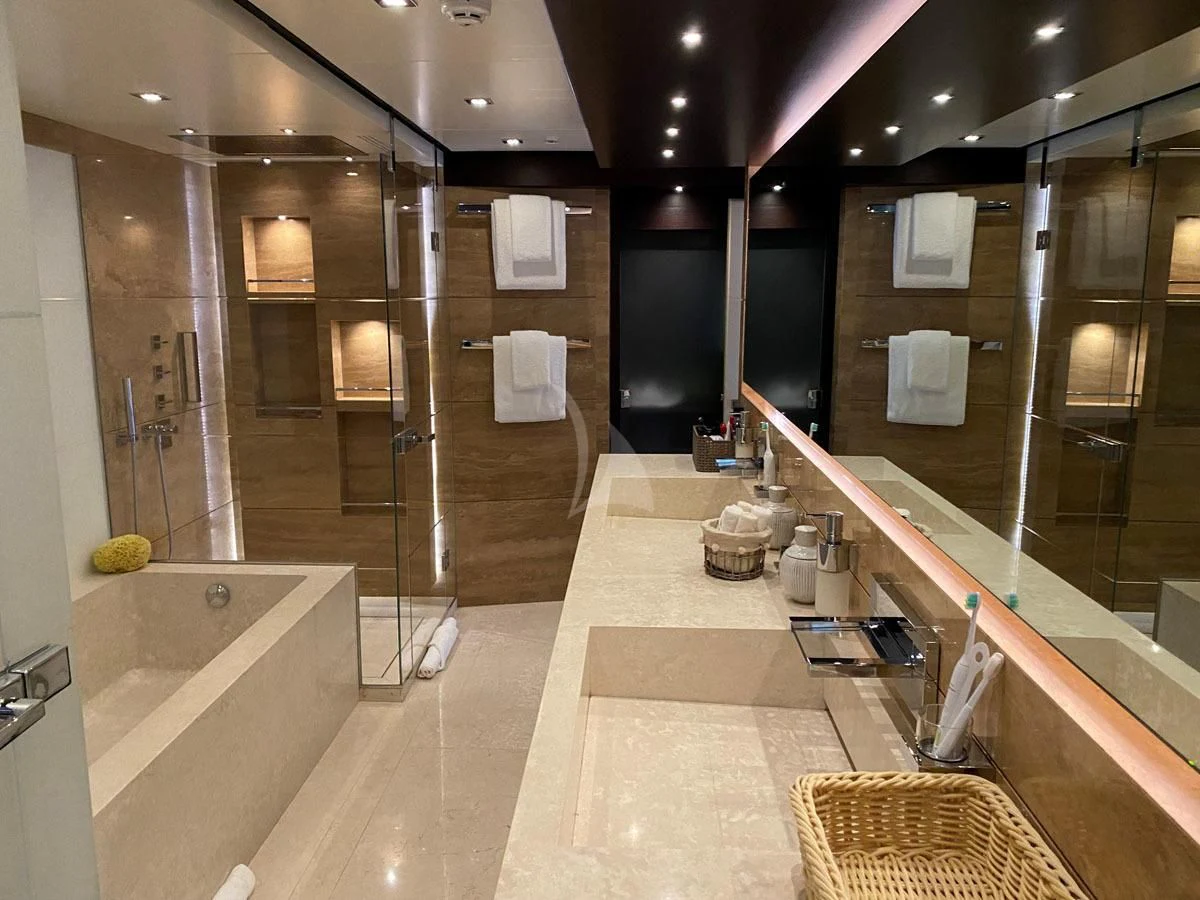a bathroom with a large tub aboard PERSEFONI I Yacht for Sale