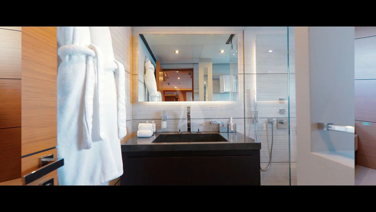 a bathroom with a sink and a mirror aboard PERSEFONI I Yacht for Sale
