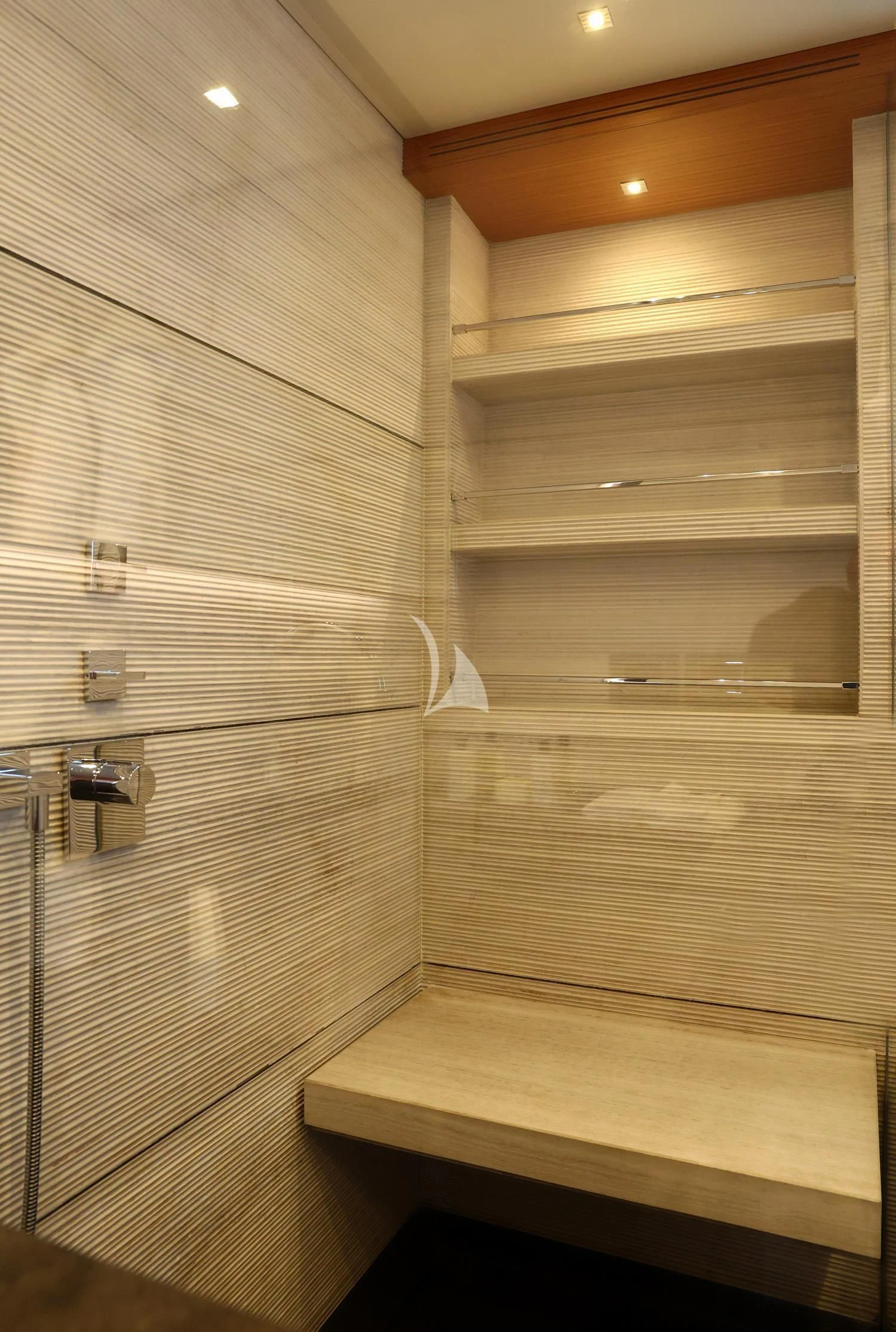 a wooden cabinet with a door aboard PERSEFONI I Yacht for Sale