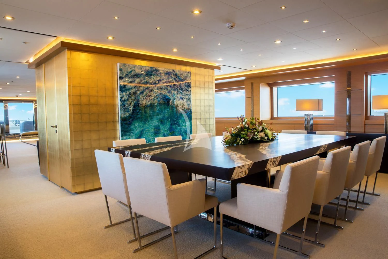 a room with tables and chairs aboard PERSEFONI I Yacht for Sale