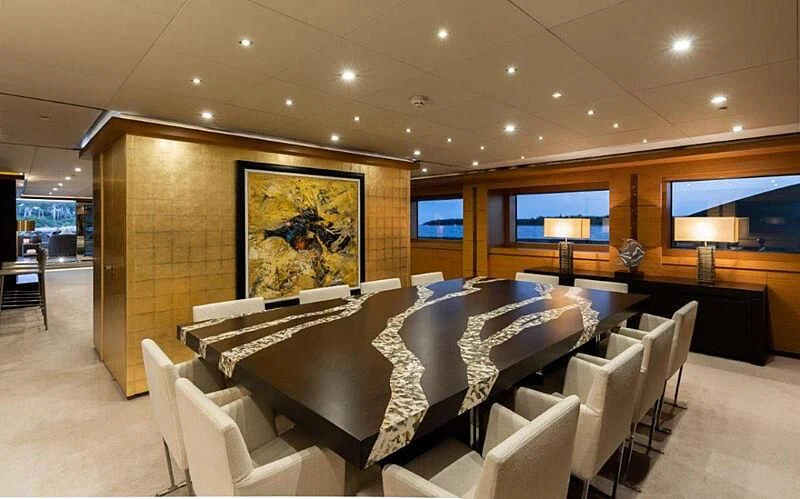 a room with a couch and chairs aboard PERSEFONI I Yacht for Sale
