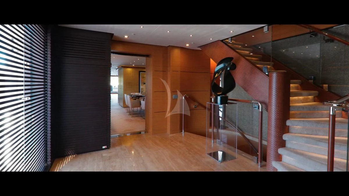 a room with a staircase and a staircase aboard PERSEFONI I Yacht for Sale