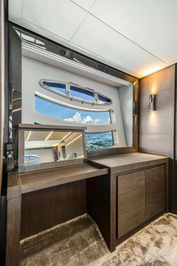 a microwave oven on a shelf aboard VIDI Yacht for Sale