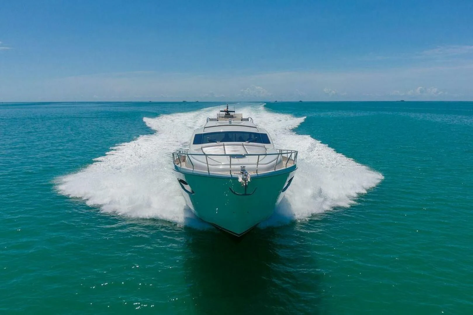 a large white ship on the water aboard VIDI Yacht for Sale