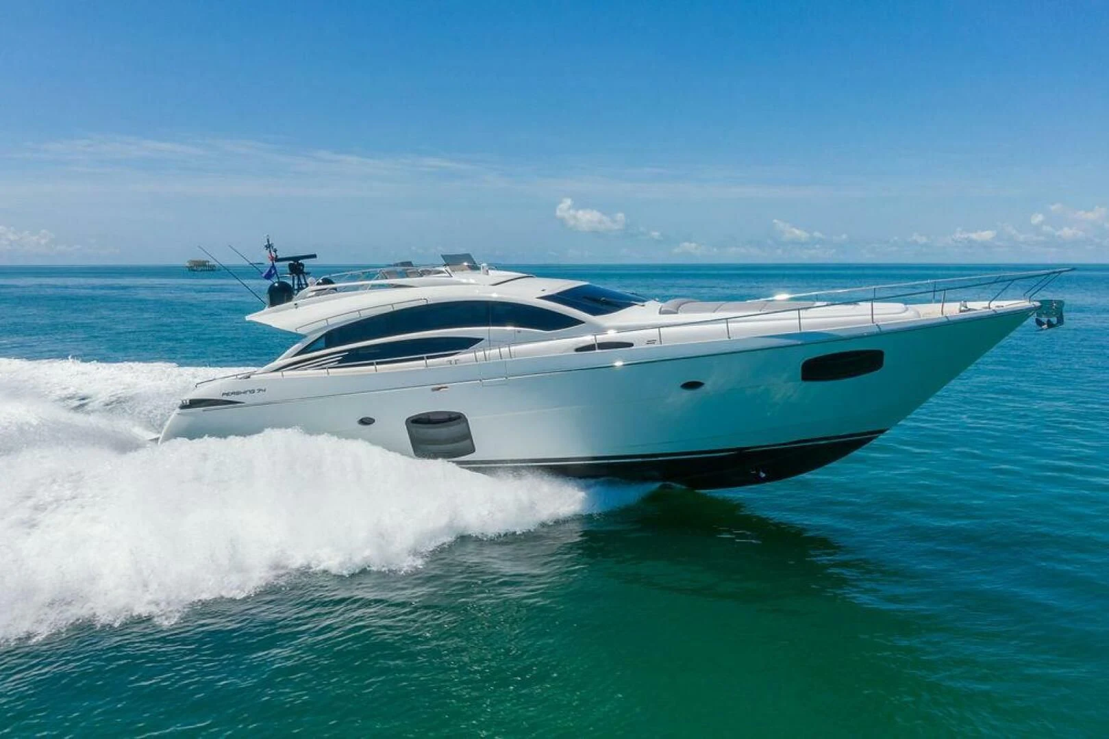 a white yacht in the water aboard VIDI Yacht for Sale