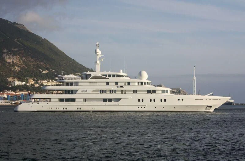a large white ship in the water aboard TUEQ Yacht for Sale