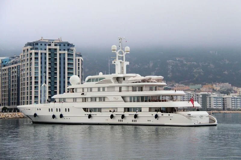 a large white ship in the water aboard TUEQ Yacht for Sale