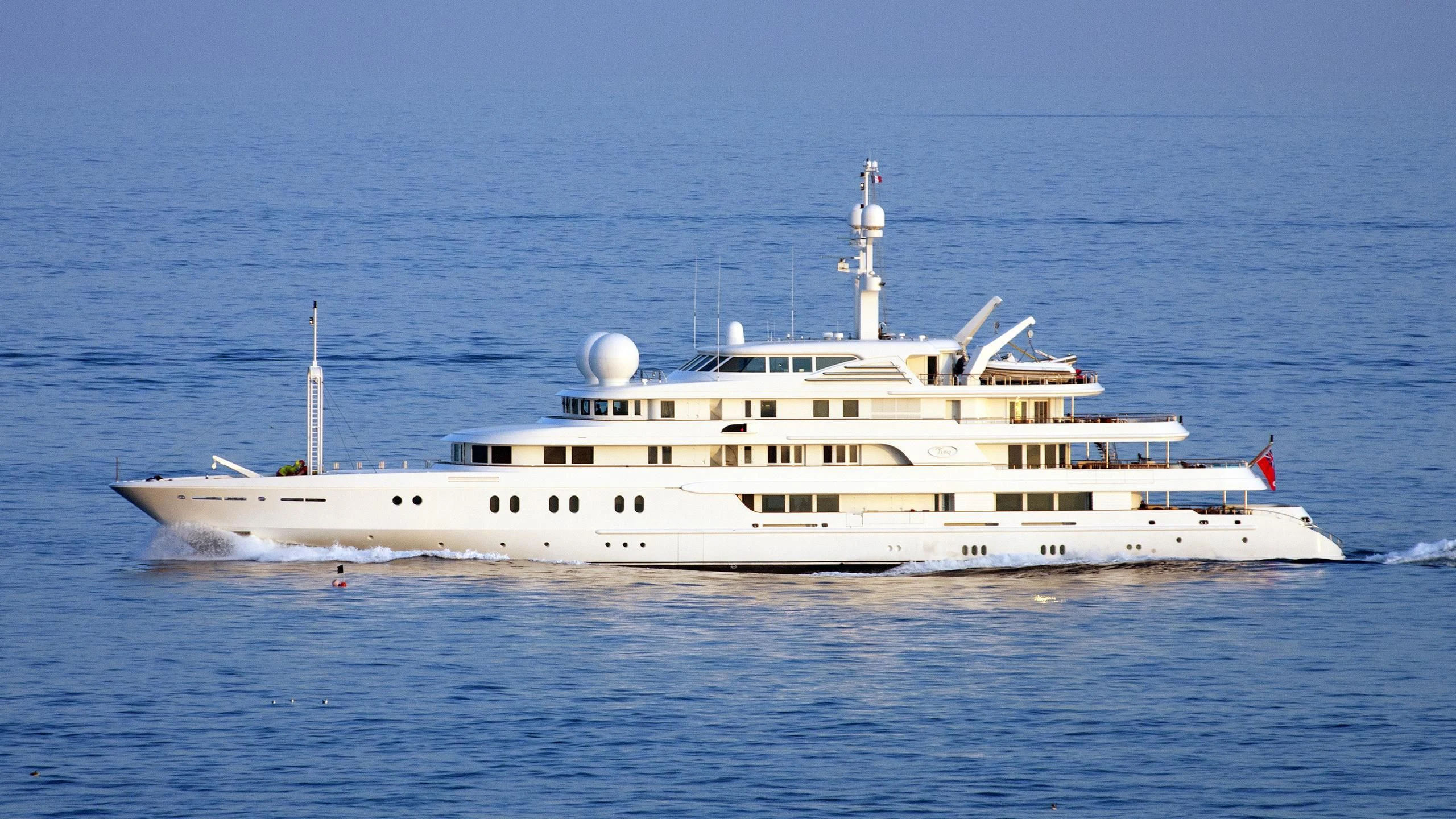 a large white ship in the water aboard TUEQ Yacht for Sale